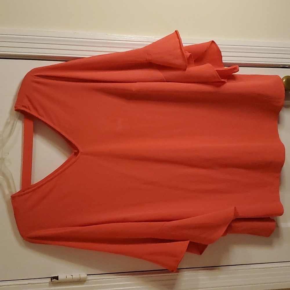 Catherine's, Bell sleeve at elbow, V-neck in the front and back.